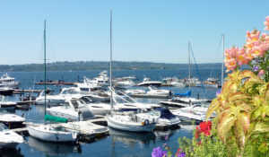 A stunning view of the dock at the Anthony's HomePort Kirkland restaurant with boats lining the water-front.